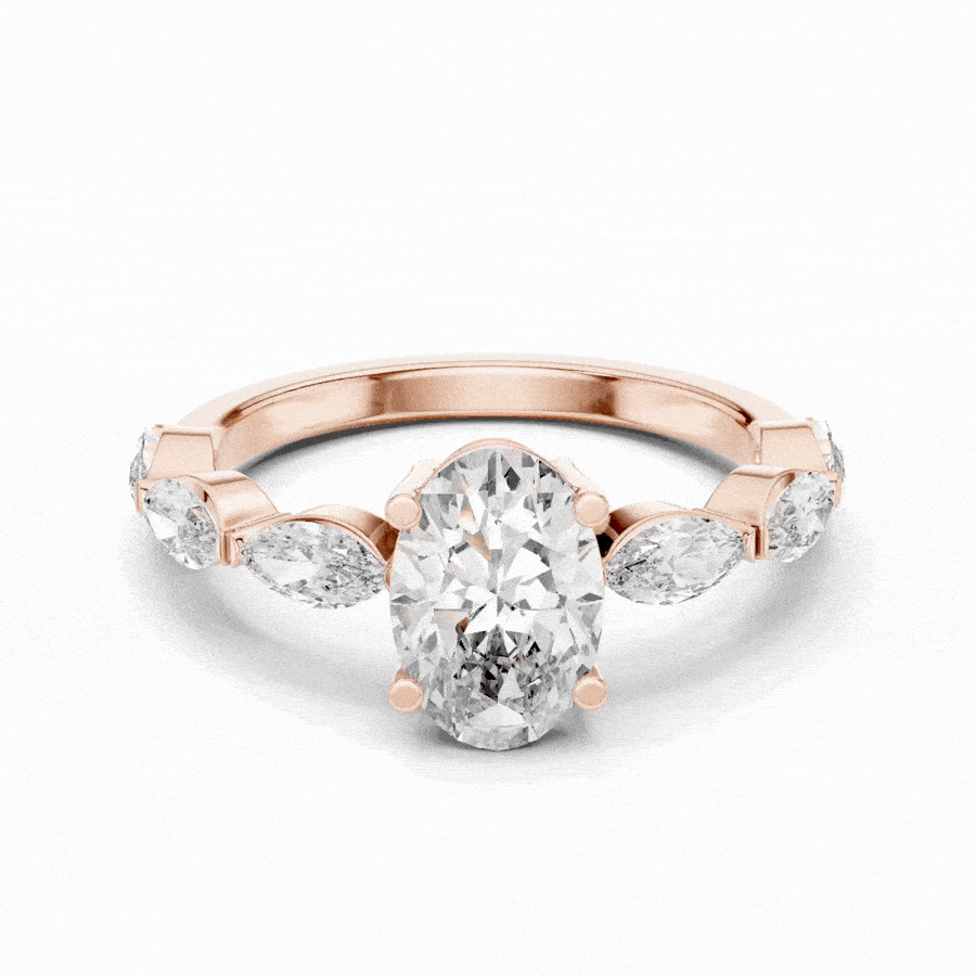 Oval Cut Diamond Ring with Marquise Side Stones